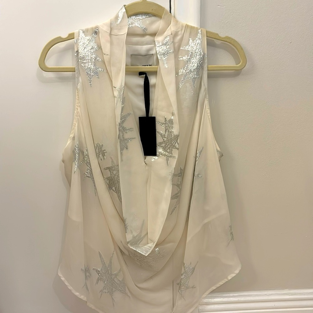 NWT. Greylin off-white razor back cocktail shirt with shiny silver stars. Size L